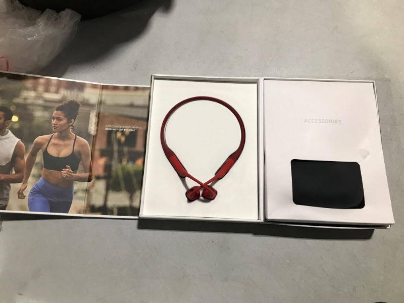 Photo 2 of Aftershokz Aeropex (Rebranded as Shokz OpenRun) - Open-Ear Bluetooth Bone Conduction Sport Headphones - Sweat Resistant Wireless Earphones for Workouts and Running - Built-in Mic Solar Red