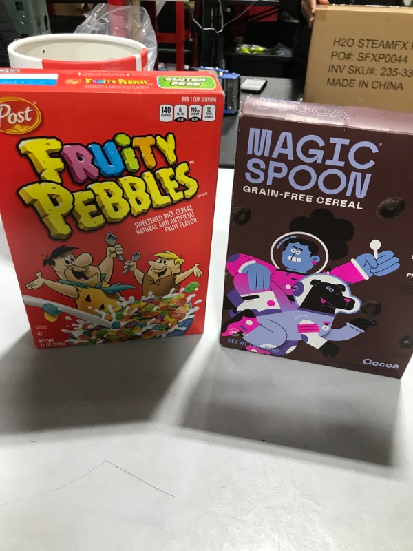 Photo 1 of 2 boxes of cereal- Fruity Pebbles and Magic Spoon