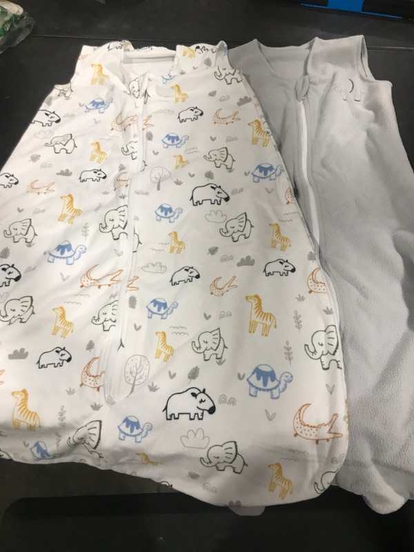 Photo 1 of 2 BABY SLEEP SWADDLERS BLANKETS
SIZE UNKNOWN