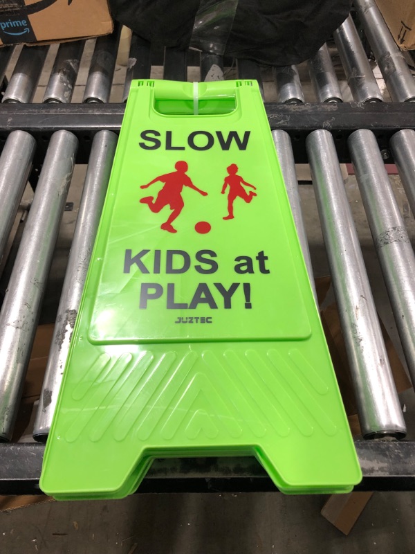 Photo 2 of Juztec Slow Children Playing Sign For Street, Caution Kids At Play Safety Sign, Down crossing traffic signs outdoor (3 Pack) Green