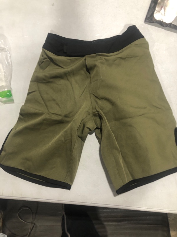 Photo 1 of army green Velcro shorts size 4 kids 