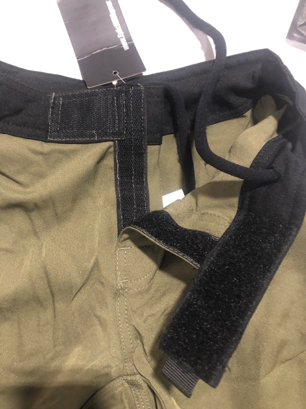 Photo 2 of army green Velcro shorts size 4 kids 