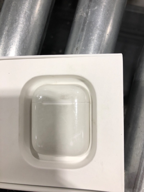 Photo 3 of Apple AirPods with Charging Case (Latest Model)