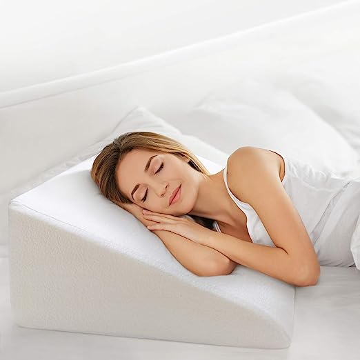 Photo 1 of  Bed Wedge Pillow, 12" Elevated Pillow for Bed Triangle Wedge Pillow 1.5 Inch Memory Foam Top with Removable Washable Cover (25"x24"x12") for Acid Reflux, Snoring, Reading, Back Pain
