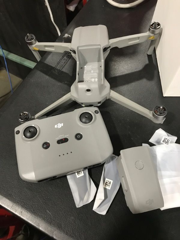 Photo 2 of missing power cord - DJI Mavic Air 2 - Drone Quadcopter UAV with 48MP Camera 4K Video 8K Hyperlapse 1/2" CMOS Sensor 3-Axis Gimbal 34min Flight Time ActiveTrack 3.0 Ocusync 2.0, Gray - UNABLE TO TEST 
