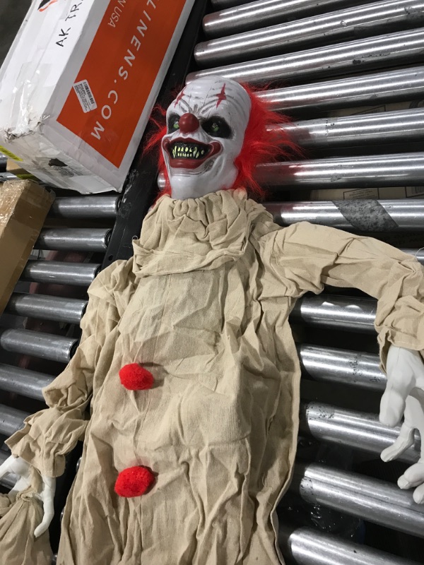 Photo 2 of JOYIN 5ft Halloween Life-Size Animated Scary Clown Figure with Moveable Head & Arms and Red Flashing Eyes for Indoor/Outdoor Halloween Clown Decorations, Halloween Props, Home Decor Yellow