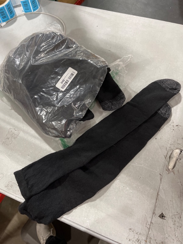 Photo 1 of A BUNVH OF BLACK LONG SOCKS UNKNOWN AMOUNT OF PAIRS