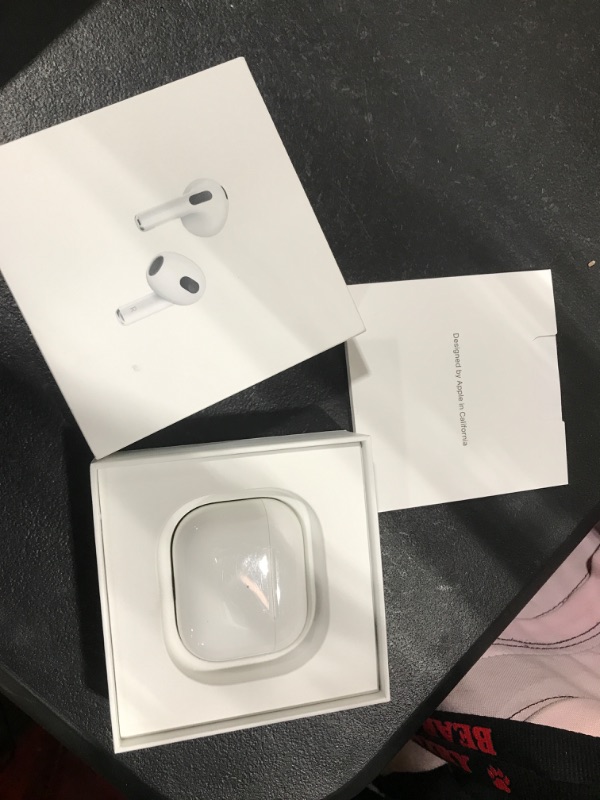 Photo 2 of Apple AirPods (3rd Generation) Wireless Earbuds with MagSafe Charging Case. Spatial Audio, Sweat and Water Resistant, Up to 30 Hours of Battery Life. Bluetooth Headphones for iPhone