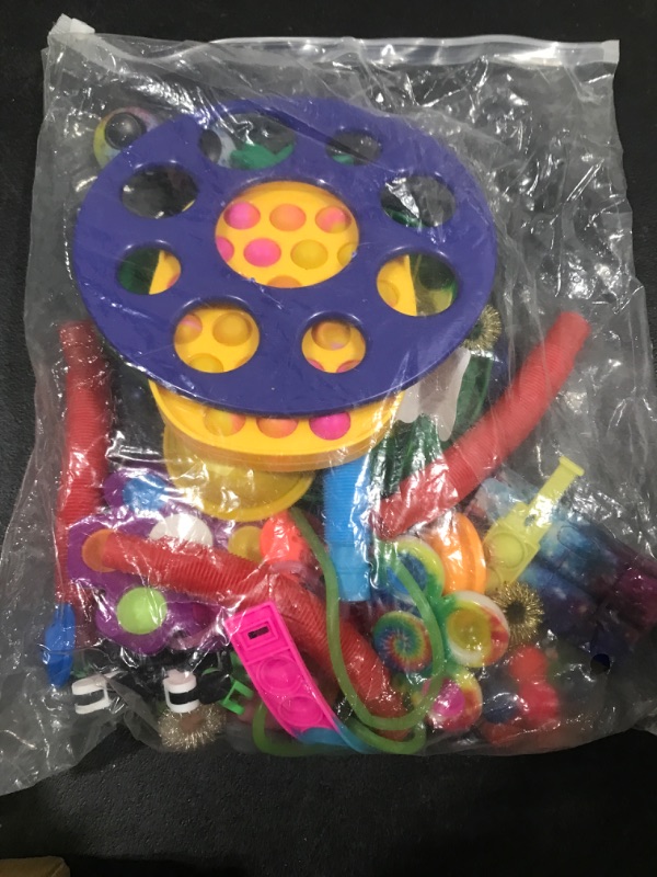 Photo 1 of Bag full of small fidget toys