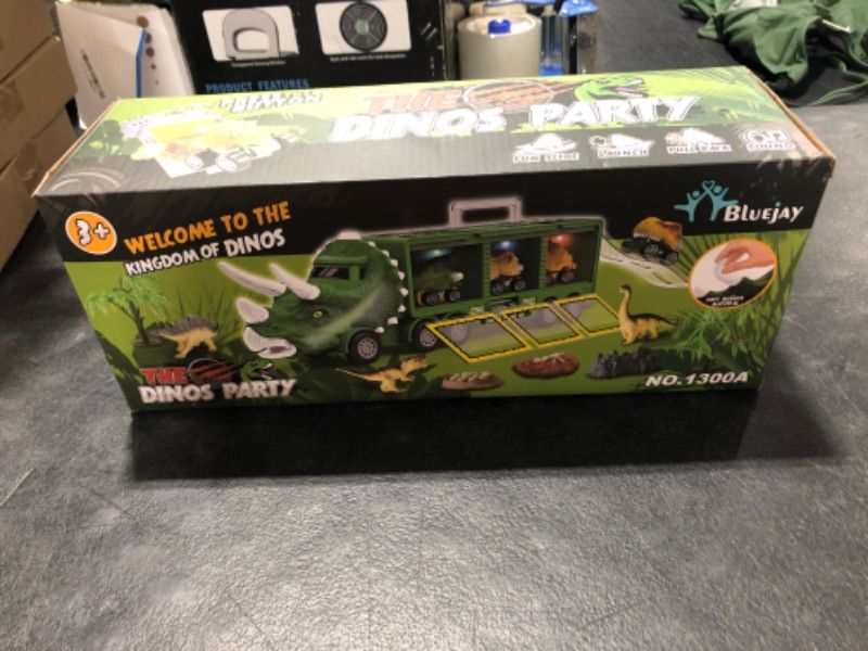 Photo 3 of BLUEJAY 21 Pack Dinosaur Toys for Kids 3-7, Dinosaur Truck with Oversized Dinosaur Map, Flashing Lights, Music and Roaring Sound, Kids Toys with 6 Pull Back Dinosaur Cars, 6 Dinosaur Toys (Green)