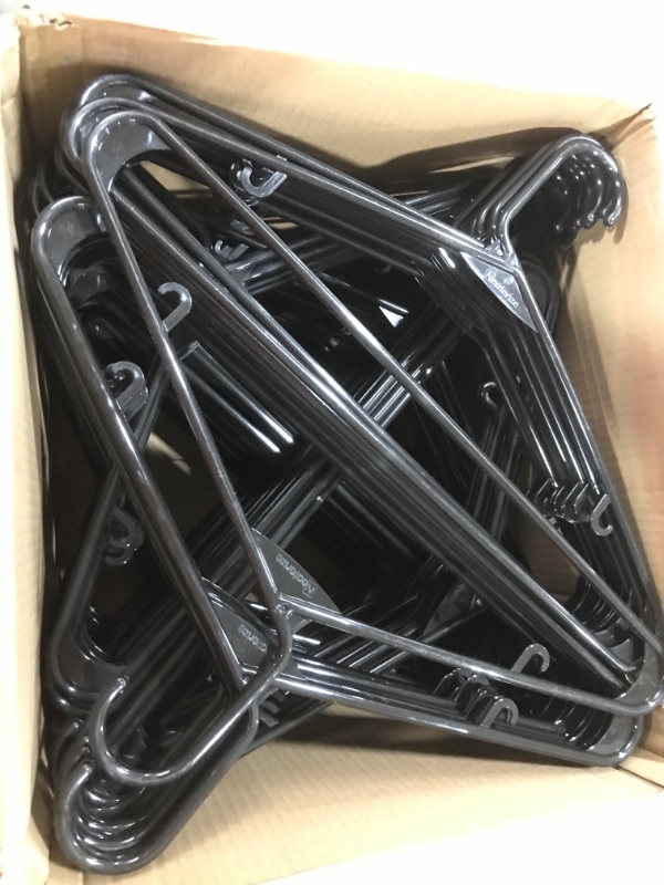 Photo 1 of 100 PACK OF BLACK PLASTIC HANGERS 