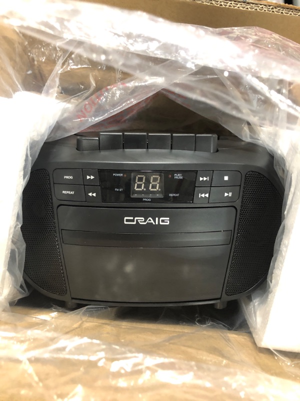 Photo 1 of Craig CD6951 Portable Top-Loading CD Boombox with AM/FM Stereo Radio and Cassette Player/Recorder in Black | 6 Key Cassette Player/Recorder | LED Display |
