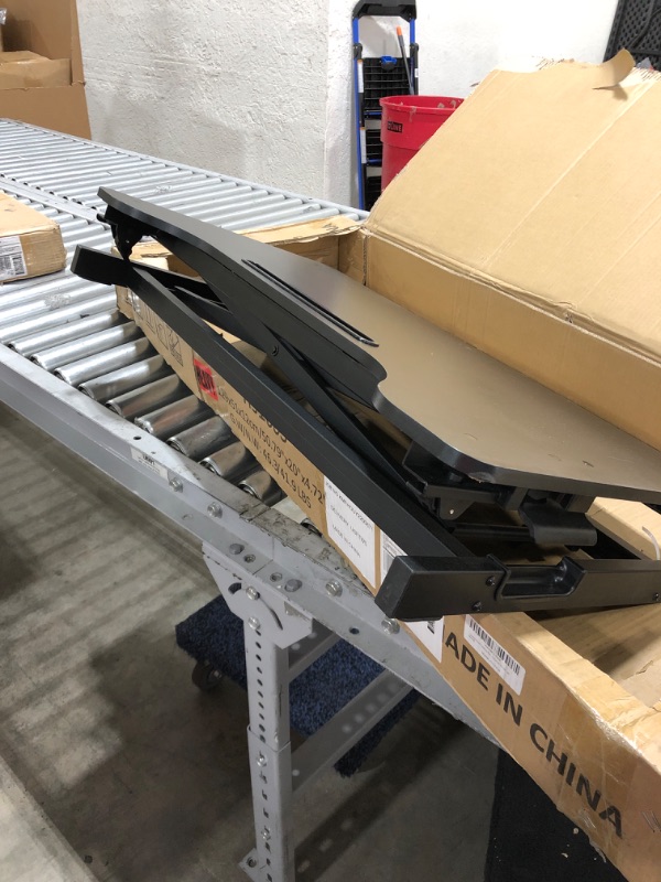 Photo 1 of black standup desk