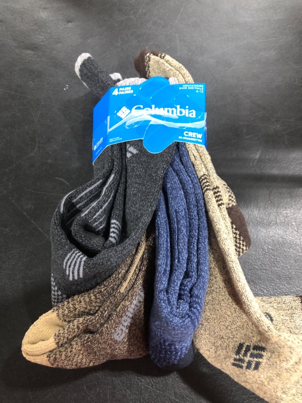Photo 1 of 4 PAIRS OF COLUMBIA SOCKS SIZE 6-12
