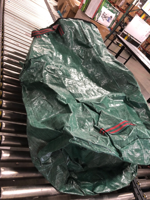 Photo 1 of 36in x 28in green tarp bag w runner