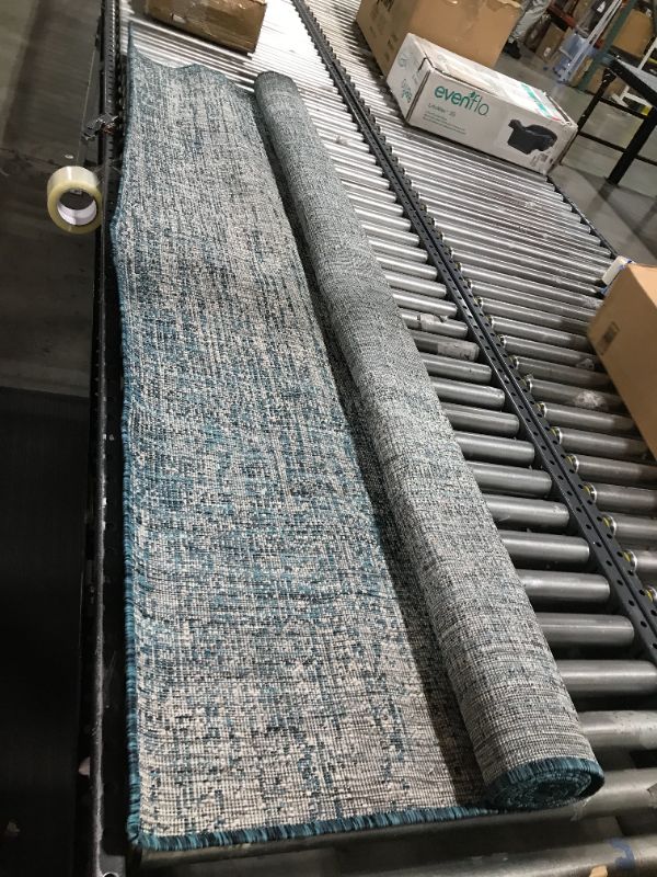 Photo 1 of 6'7" x 9' area rug --- color green 