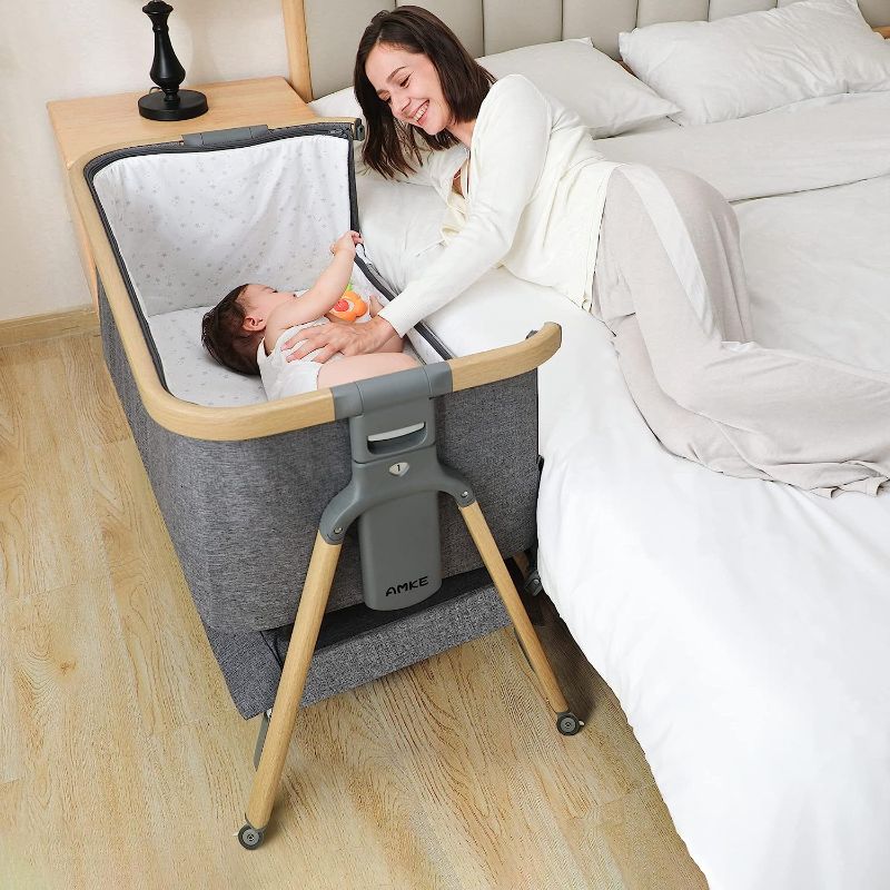 Photo 1 of AMKE Bedside Sleeper for Baby,35s Quick Assemble Crib with Storage Basket,Portable Bassinets for Safe Co-Sleeping, Adjustable Bed for Infant Newborn