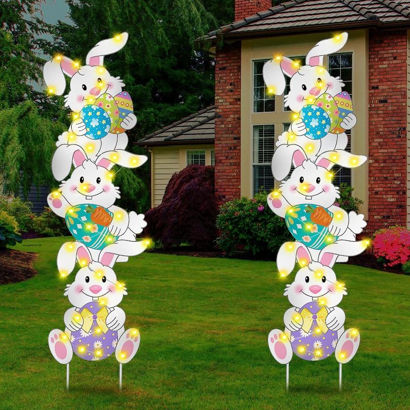 Photo 1 of 2 Sets Tumbling Bunnies Yard Stakes 43.3 Inch Outdoor Easter Decorations Corrugated Plastic Funny Easter Yard Signs with 2 Warm LED String Lights 6 Stakes for Easter Outdoor Lawn Garden Decorations