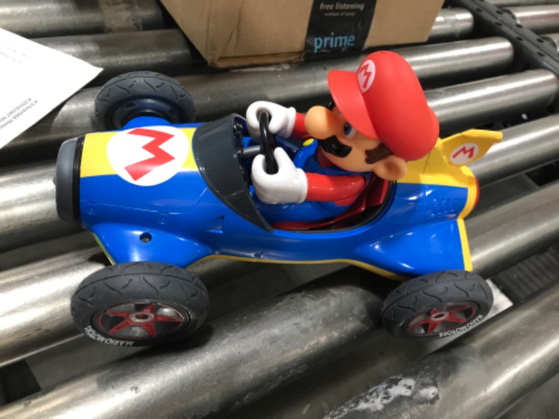 Photo 2 of Carrera 181066 RC Official Licensed Kart Mach 8 Mario 1: 18 Scale 2.4 Ghz Remote Radio Control Car with Rechargeable Lifepo4 Battery - Kids Toys Boys/Girls Mario Kart Mach 8 - Mario