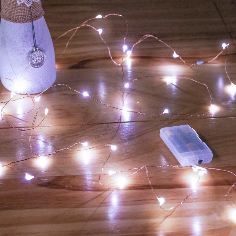 Photo 1 of Mikasol Fairy Lights Battery Operated, 4 Packs Mini 3*AAA Battery Powered Copper Wire Led Starry String Lights Firefly Lights for Bedroom, Christmas, Parties, Decoration (5m/16ft Cool White)
