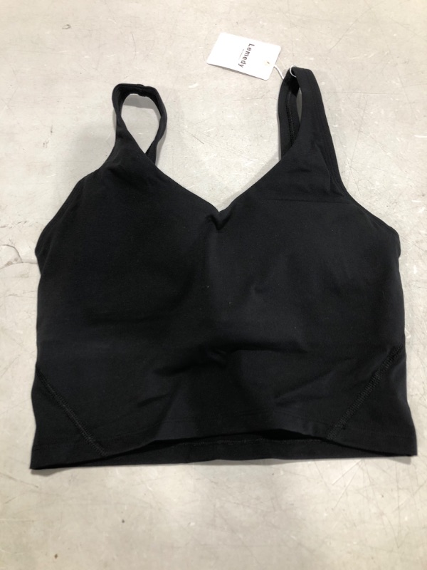 Photo 1 of Size 4 sports bra/shirt 