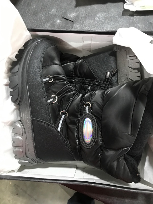 Photo 1 of BLACK BOOTS SIZE 1 