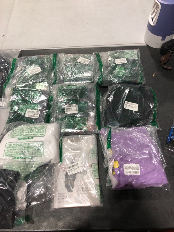 Photo 1 of Box lot of new and used clothing and shoes for men, women, and kids. Sold as is.