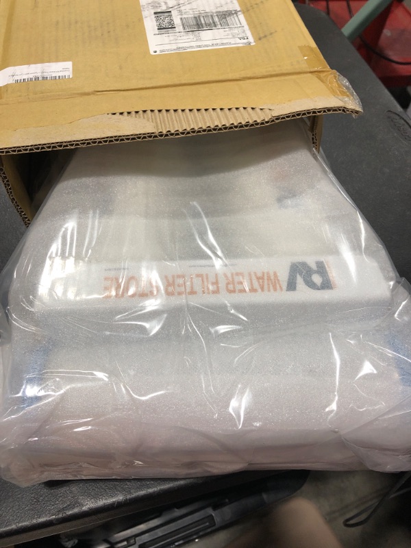 Photo 2 of Essential RV Water Filter System with Hose Fittings - Premium RV Water Filtration System with Cyst Removal--NEW, BOX DAMAGE 