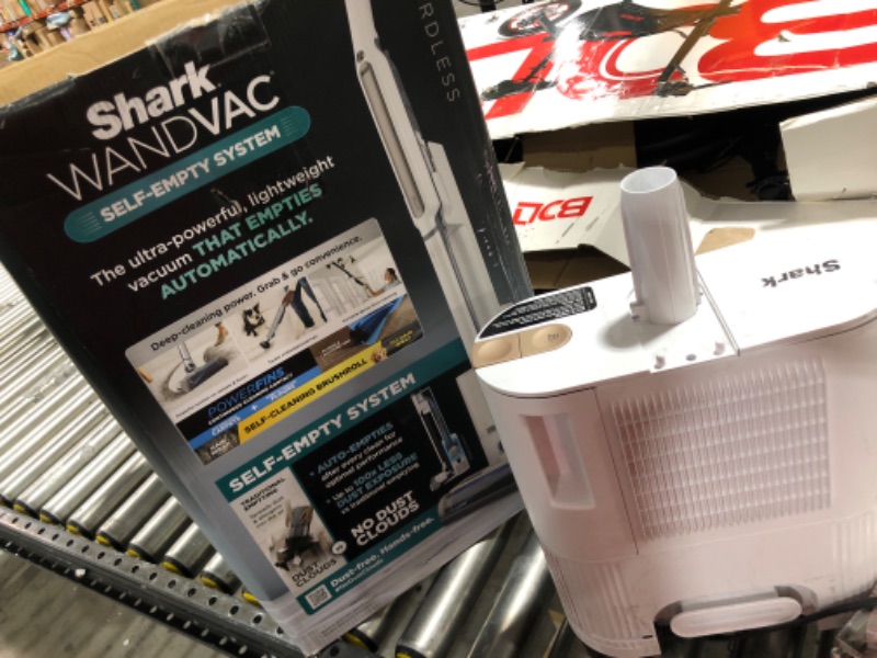 Photo 2 of Shark WS642AE WANDVAC System, Ultra-Lightweight Powerful Cordless Stick Vacuum with HEPA Empty Base, Anti-Allergen Complete Seal, PowerFins, Self-Cleaning Brushroll & Pet Tool, White