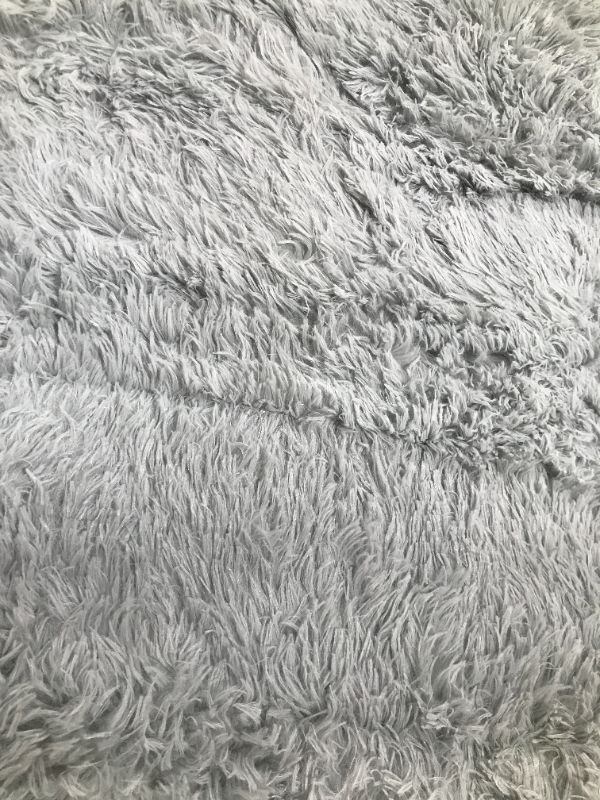 Photo 1 of 62" x 93" area rug --- color grey 