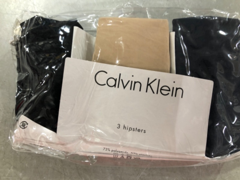 Photo 2 of Calvin Klein Women's Invisibles Seamless Hipster Panties, Multipack Large Speakeasy, Light Caramel, Black