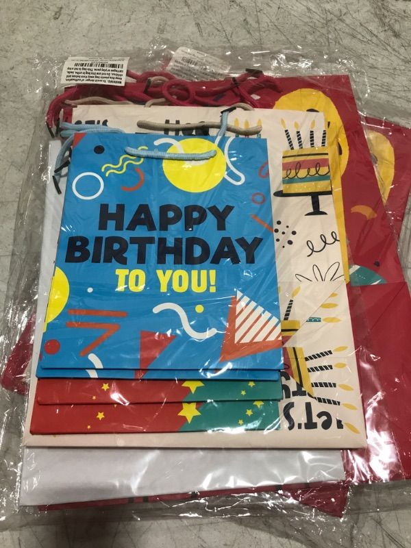 Photo 1 of 10 Pack Birthday Gift Bag Assortment With Tissue Paper - Large, Medium, and Small Gift Wrap Bags With Handles 