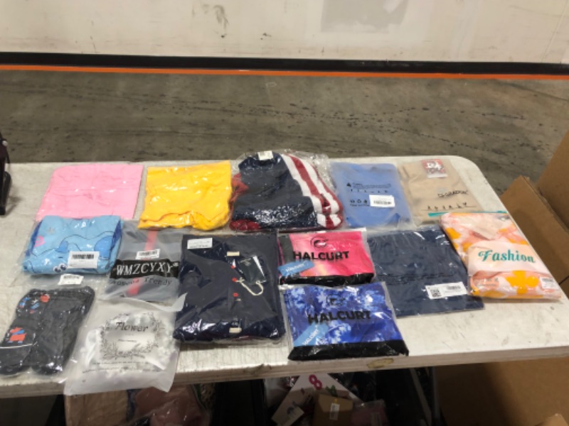 Photo 1 of Box lot of random clothes, new & used, clothes are random sizes and genders