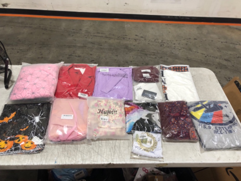 Photo 1 of Box lot of random clothes, new & used, clothes are random sizes and genders