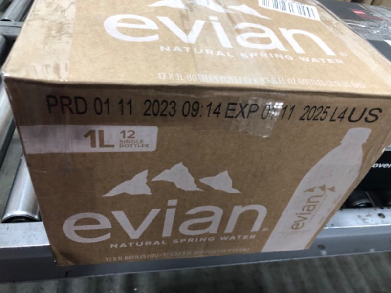 Photo 1 of evian Natural Spring Water, Naturally Filtered Spring Water in Large Bottles, 33.81 Fl Oz (Pack of 12)