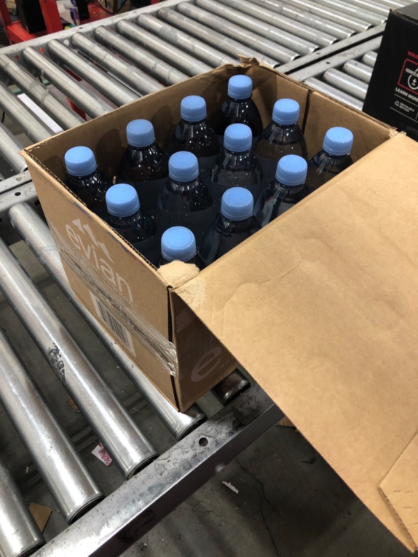 Photo 1 of evian Natural Spring Water, Naturally Filtered Spring Water in Large Bottles, 33.81 Fl Oz (Pack of 12)