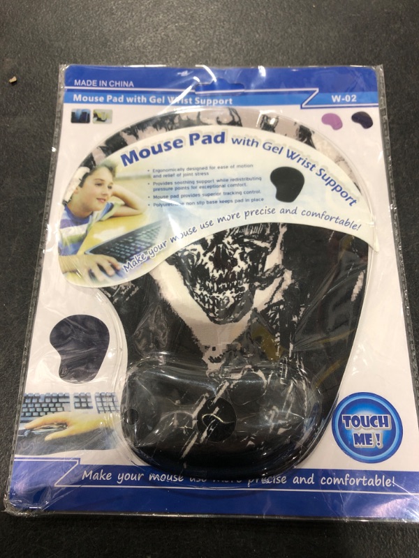 Photo 1 of Mouse pad with gel wrist support- skull