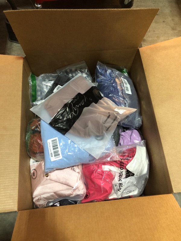 Photo 2 of Box lot FULL of brand new clothing in various styles and sizes for men, women and kids. Sold as is.