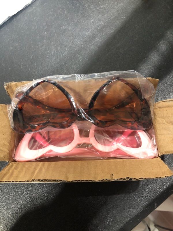 Photo 2 of AOOFFIV Heart Shape Sunglasses Rimless Transparent Candy Color Heart Glasses Love Eyewear Party Favors(8805-double pink+Leopard print)