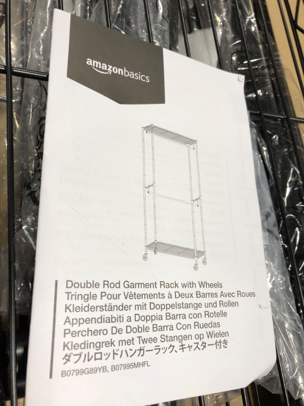 Photo 1 of Amazon Basics Adjustable, Double Hanging Rod Garment Rolling Closet Organizer Rack - Black, 72 inches Black Double Rod