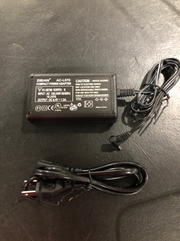 Photo 2 of CA-570 AC Adapter Charger Compatible Canon FS21 FS22 FS200 FS300 HF10 HF11 HF20 HF100 HF200 HF M31 HF S10 HG20 HG21 HG30 HR10 HV10 HV20 HV30 HV40 XA10 ZR80 ZR85 ZR90 ZR100 ZR200