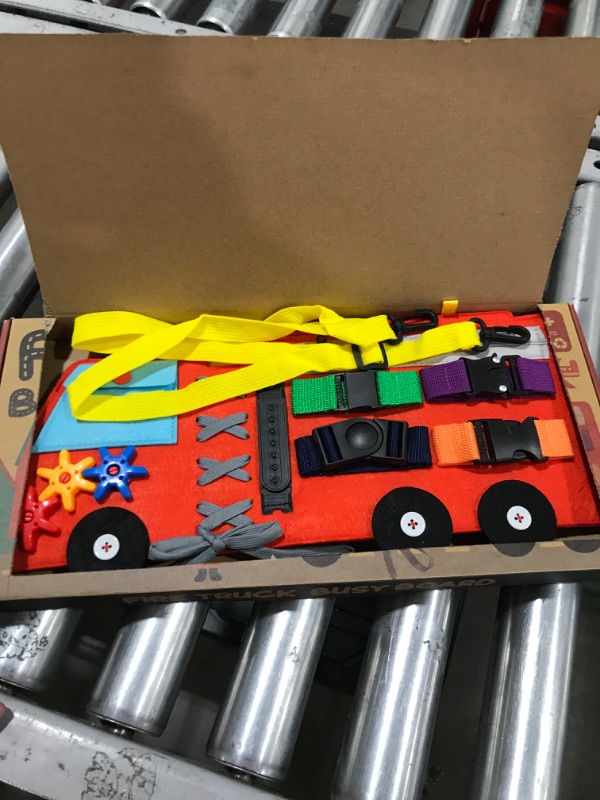 Photo 2 of Busy Board for Toddlers 1-3 or 2-4, Firetruck Preschool Educational Early Learning Toy, Basic Life Skills and Fine Motor Montessori Activities for Kids, Learn to Dress Sensory Toy as Travel Game