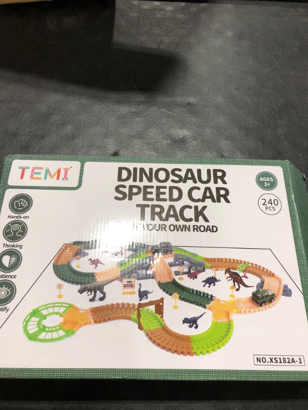 View 2 of TEMI Dinosaur Train Track Toy Set with Race Cars and Jurassic Dinos for Kids Toddlers 2 3 4 5 Years, Create A Dinosaur World Road with Flexible Tracks, Birthday Gifts for Boys and Girls 239pcs
