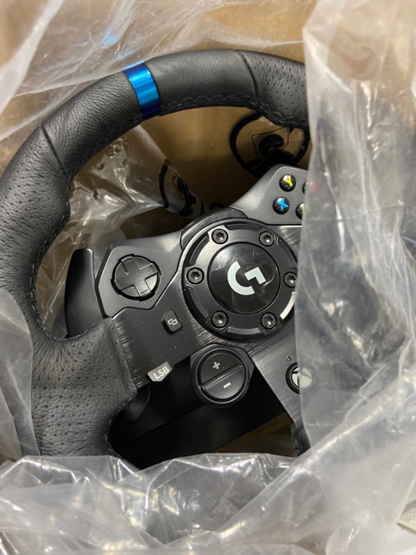 Photo 3 of Logitech G923 Racing Wheel and Pedals for Xbox X|S, Xbox One and PC featuring TRUEFORCE up to 1000 Hz Force Feedback, Responsive Pedal, Dual Clutch Launch Control, and Genuine Leather Wheel Cover Xbox|PC Wheel Only