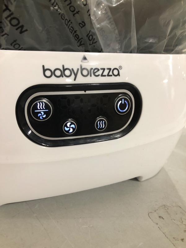 Photo 3 of Baby Brezza Baby Bottle Sterilizer and Dryer Advanced – Electric Steam Sterilization Machine – Universal Sterilizing for All Bottles: Plastic + Glass + Pacifiers + Breast Pump Parts - HEPA Filtration