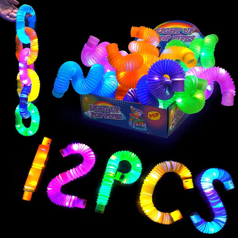 Photo 1 of 12 Pack LED Pop Tube Toys, Light Up Fidget Tubes, Colorful Sensory Tubes, Kids Party Sticks Toys, Party Favor Sensory Fidget Toys.
