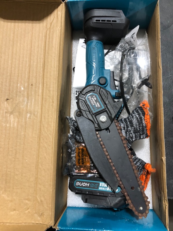 Photo 2 of Mini Chainsaw 6-Inch with 2 Battery, Cordless power chain saws with Security Lock, Handheld Small Chainsaw for Wood Cutting Tree Trimming Blue