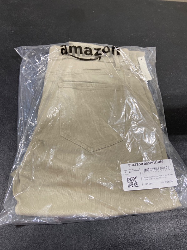 Photo 2 of Amazon Essentials Men's Slim-Fit Stretch Jean 34W x 34L Light Khaki Brown