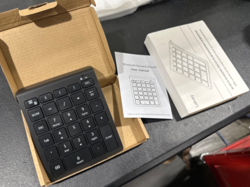 Photo 2 of Bluetooth Number Pad, Lekvey Portable Wireless Bluetooth 28-Key Numeric Keypad Keyboard Extensions for Financial Accounting Data Entry for Smartphones, Tablets, Surface Pro, Windows, Laptop and More
