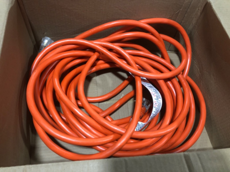 Photo 2 of Iron Forge Cable 50 Foot Lighted Outdoor Extension Cord - 10/3 SJTW Orange 10 Gauge Extension Cable with 3 Prong Grounded Plug for Safety, 15 AMP - Great for Garden and Major Appliances 50 Foot Orange